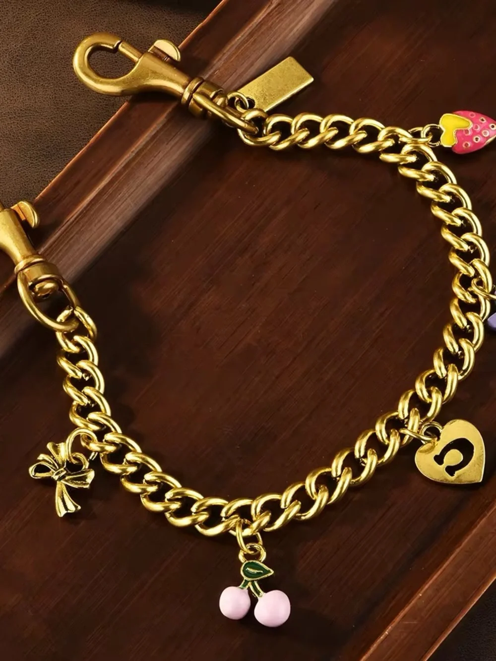 Gold Bag Charm Chain with Pink Accents
